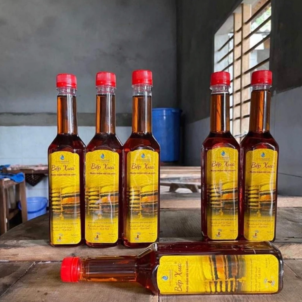 Thùng 6 chai mắm nhĩ tặng 1 chai cốt bé